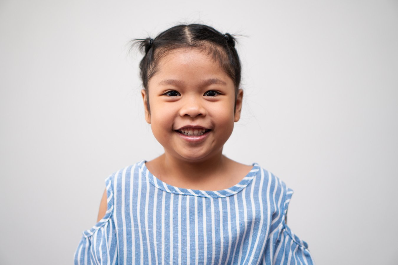 Portrait of Asian child 5 year old and to collect hair and a